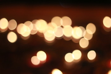 Bokeh of the candle on the golden mounth