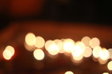 Bokeh of the candle on the golden mounth