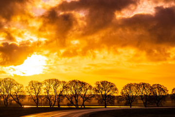beautiful bright pink sunset over the river, selective focus