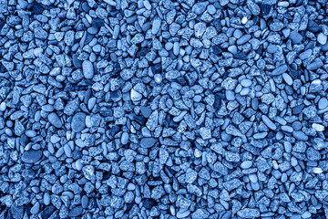 Stones background or texture, copy space. Granite gravel or crushed stones background with copy space