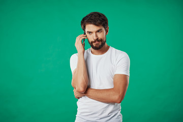 young man listening to music with headphones