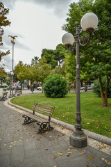 Naklejka premium Park by Autumn in the City by Morning