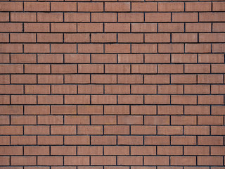 Wide red brick wall texture. background