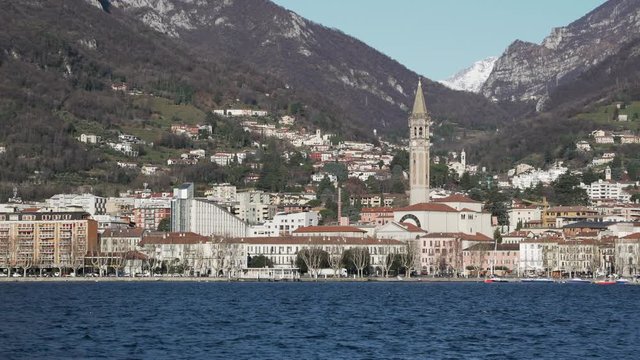 Close up of the city of Lecco on a windy day seen from Malgrate