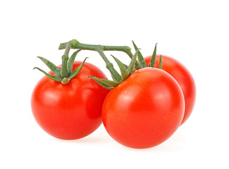 Tomatoes cherry on green branch isolated on a white background