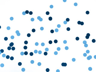 Blue color confetti on white background. Holiday background.