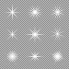 White glowing light explodes on a transparent background. Sparkling dust particles. Bright Star. Transparent shining sun, bright flash. Vector sparkles. To center a bright flash