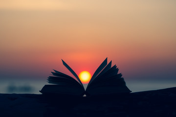 Open Book Bible on wood background outdoor God's promises in daily life Abstract styleTone...