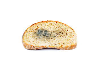 Moldy spoiled bread on an isolated white background. Food unsuitable for food due to mold.