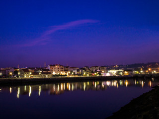 Fototapeta na wymiar Night view between two bridges of Ría de Pontevedra