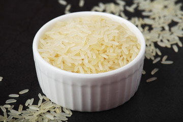 A glass bowl with white long-grain rice