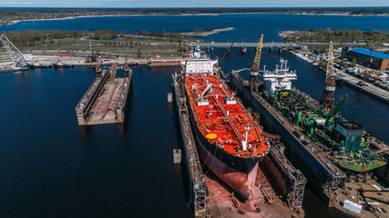 Tanker vessel repair in dry dock Shipyard, Drone shot