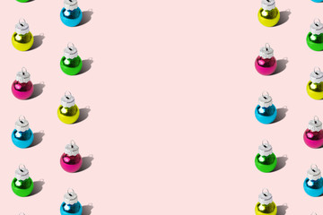 Pattern texture abstract made of multicolored baubles isolated on rose.