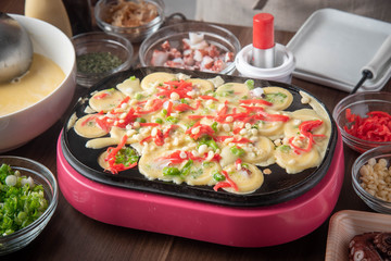 cooking home style takoyaki, japanese octopus balls