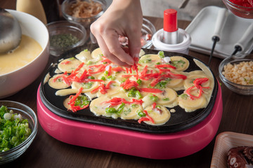 cooking home style takoyaki, japanese octopus balls