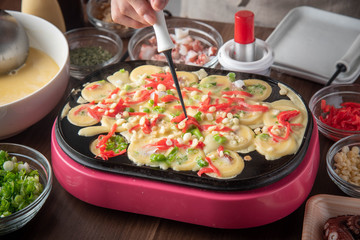 cooking home style takoyaki, japanese octopus balls