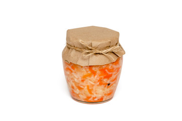 Homemade sauerkraut with carrot in a glass jar on white background. Fermented food. Natural probiotik. Healthy eating and diet concept. Copy space