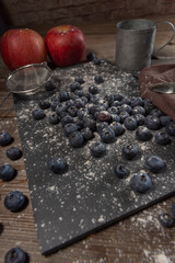 Blueberries on rustic table for healthy eating and nutrition