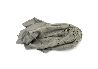 Old dirty torn rag isolated on white background. Cleaning rag.