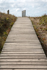Fototapeta na wymiar Wooden Footpath at Xago Beach; Asturias