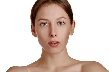 Obraz premium Beautiful young woman with clean fresh skin. Face treatment. Cosmetology, beauty and spa. Natural clear skin, close-up face