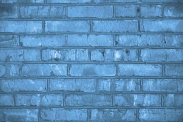 Beautiful brick wall grunge decorative classic blue background. Classic blue colour monochrome texture banner with space for text. Grunge classic blue texture. Monochrome classic blue background.