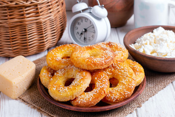 Fresh cheese bagels with sesame seeds