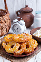 Fresh cheese bagels with sesame seeds
