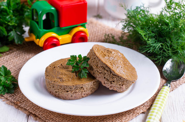 Liver souffle in a white bowl on the table