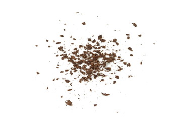 Grated chocolate. Heap of ground chocolate isolated on white background with clipping path, closeup.