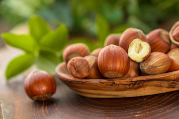 Close up of hazelnuts on wooden table