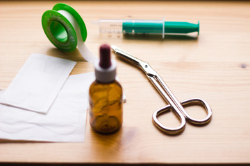 medical utensils on a wooden background