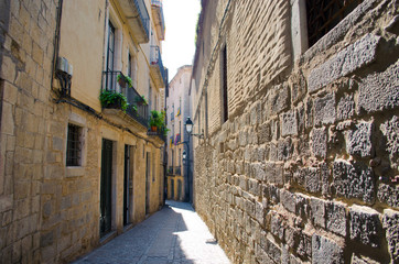 The narrow streets of the Jewish quarter in Girona, Catalonia, Spain