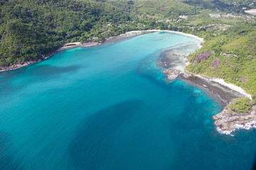 Fototapeta na wymiar Aerial view of bay with white sand beach in Seychelles, Mahe Island