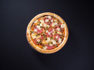 Restaurant tasty pizza on blackboard