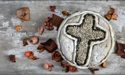 Homemade decorated Serbian slava bread with red wine.