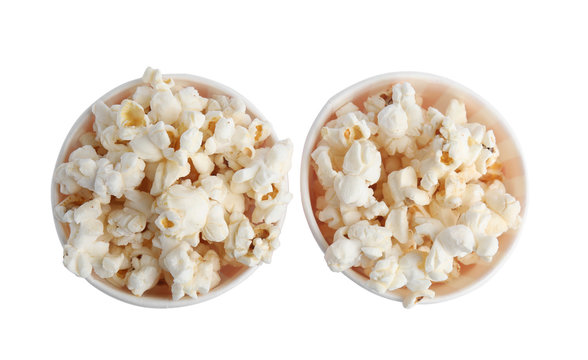 Buckets of tasty pop corn isolated on white, top view