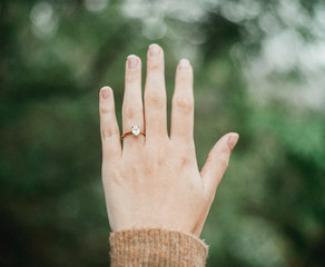 Engagement ring on a woman's finger