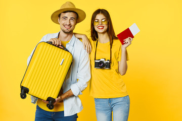 couple painting wall with paint roller