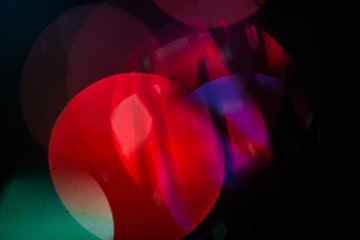 Round highlights on spruce background