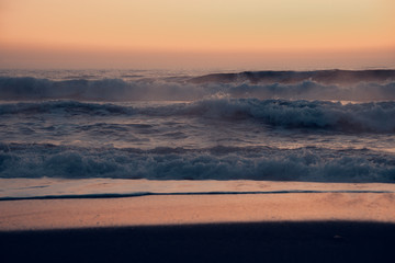 Fototapeta premium Beautiful sunrise on the sea coast in a storm