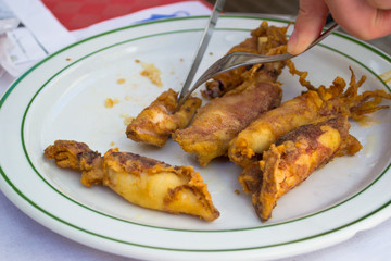 Seafood in the restaurant. Fried squid.
