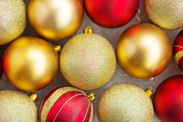 red and gold christmas balls, christmas lights, flat lay christmas photo