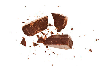 Chocolate pieces isolated on white background. Top view.