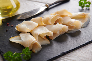 Delicious smoked halibut slices close up