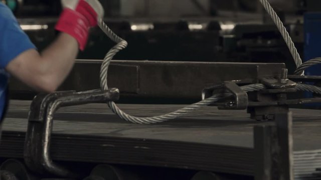 Aluminum metal shiny steel new sheets stacked with big wire rope sling