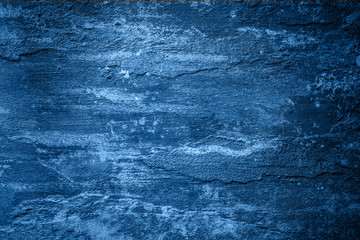Design textured sea sand banner tinted with 2020 classic blue trend color with an inscription. The...