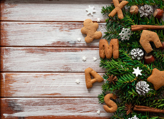 Gingerbread words Merry Christmas on the wooden background