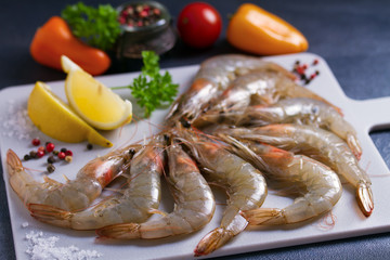 Fresh raw pacific whole shrimps with ingredients