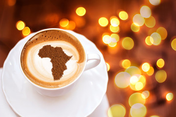 Cup of cappuccino with a picture of Africa